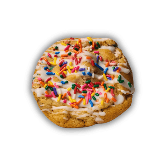 Cookie with sprinkles and white chocolate drizzle
